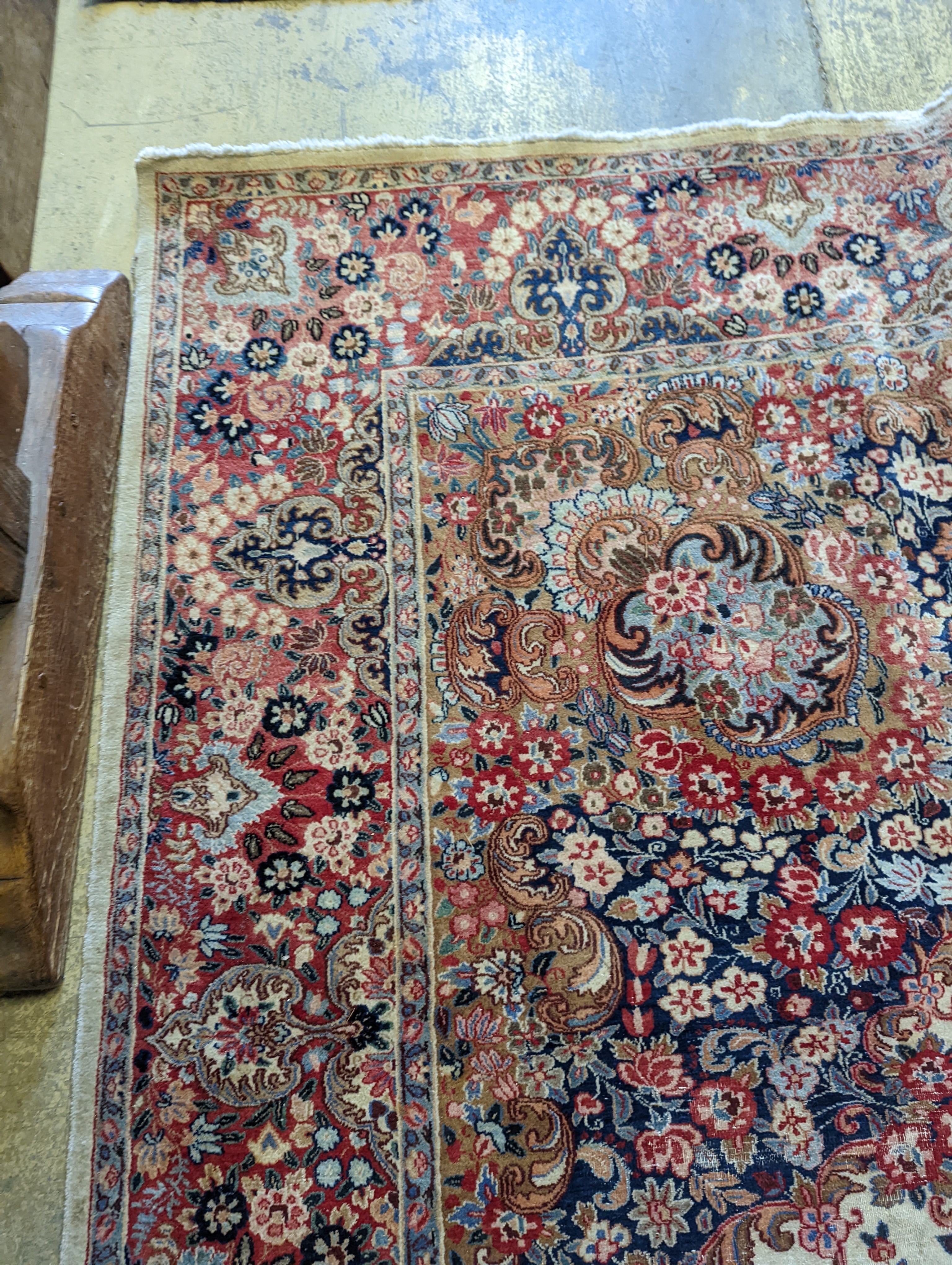 A North West Persian ivory ground carpet, 410 x 310cm